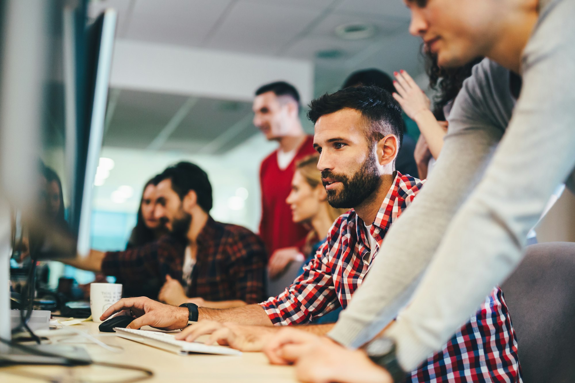 Portrait of programmers working in development software company