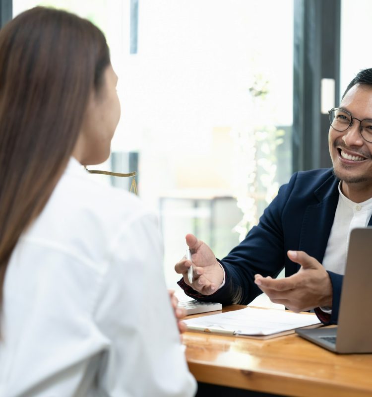 lawyer insurance broker consulting giving legal advice to couple customer about buying renting