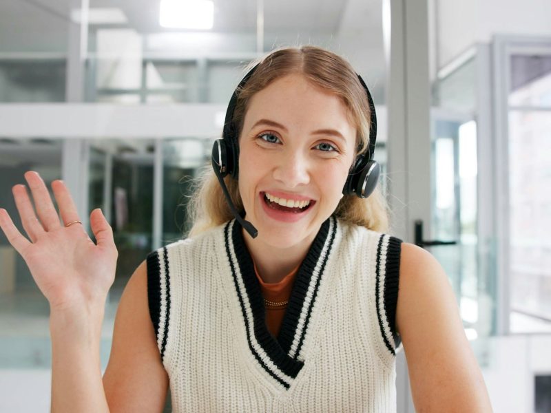 video call portrait and woman in office with headset smile or crm consultant in sales support web video call portrait and woman in office with headset smile or crm consultant in sales support web